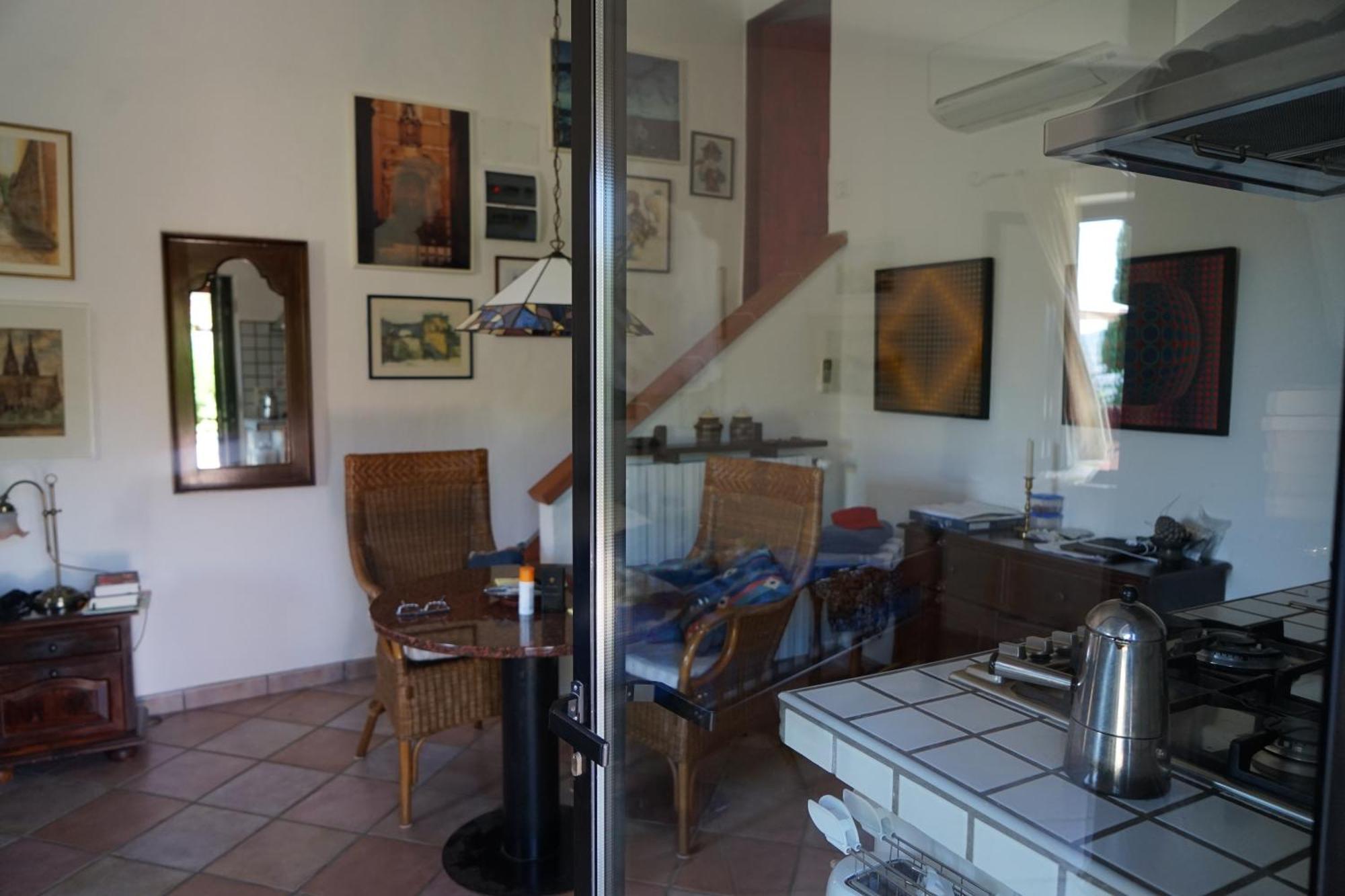 Studio-Appartment In Landhaus Mit Meerblick Porto Azzurro Bagian luar foto